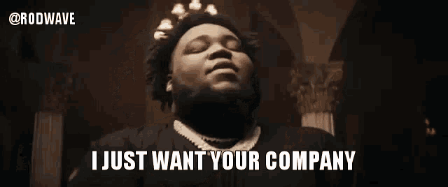 a man with a beard is saying `` i just want your company '' in a video .