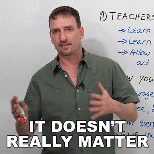 a man stands in front of a white board with the words " it does n't really matter "