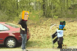 a man with a paper bag on his head stands next to a child with a sword and shield