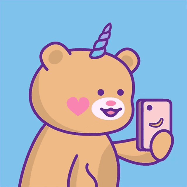 a teddy bear with a unicorn horn is taking a picture of himself