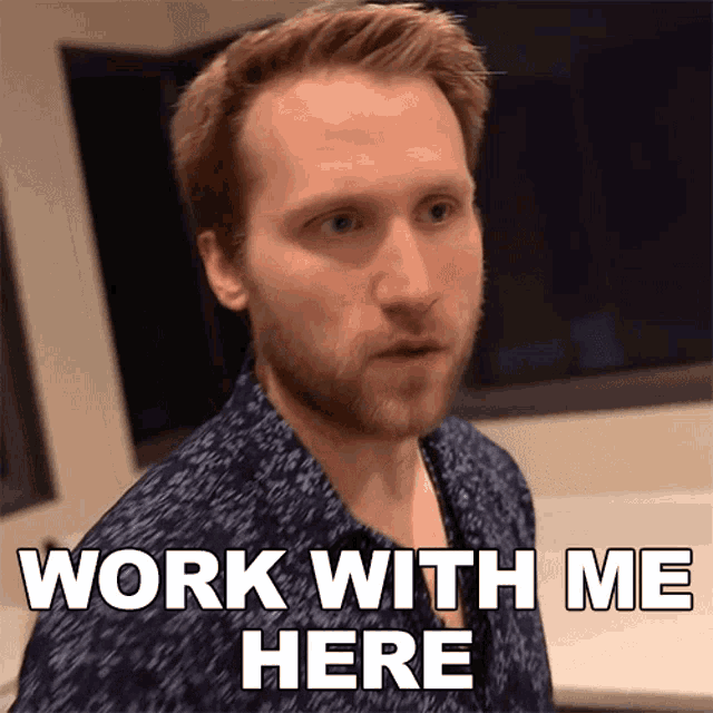 a man says work with me here in white letters