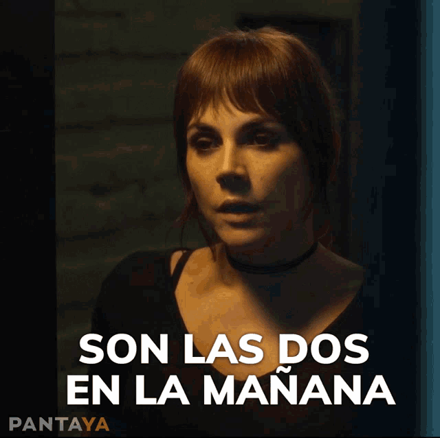 a picture of a woman with the words son las dos en la manana on it