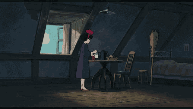 a girl with a red bow on her head is drinking from a cup in a dark room