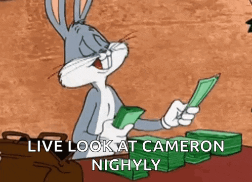 bugs bunny from looney tunes is holding a stack of money and says `` live look at cameron nightly '' .