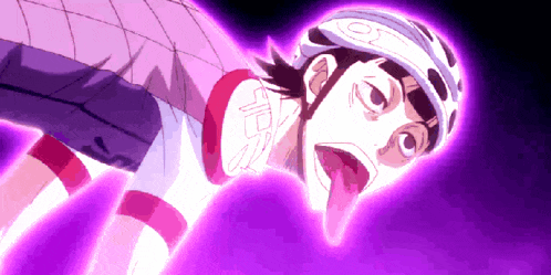 a person wearing a helmet with the letter o on it is sticking out their tongue