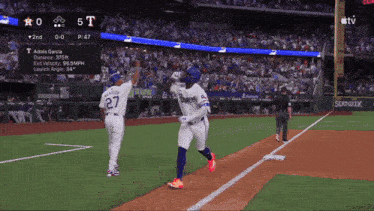 a baseball game between the dodgers and the astros is being shown on tv
