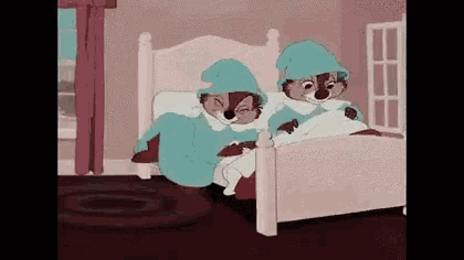 two cartoon squirrels are sitting on a bed in a bedroom .