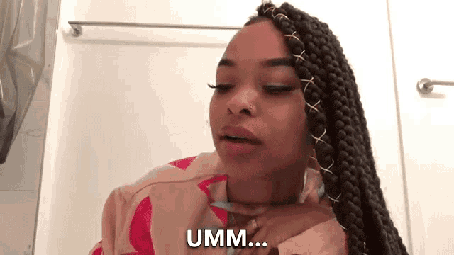a woman with braids and a nose ring says umm ...