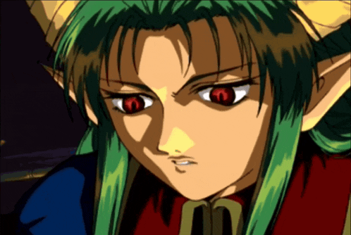 a close up of a cartoon character with red eyes and green hair