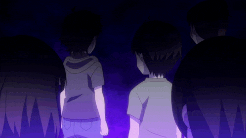 a group of children are standing in the dark with their eyes lit up
