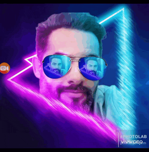 a man with a beard wearing sunglasses with a reflection of himself