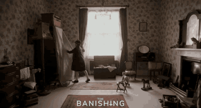 a poster for the movie the banishing shows a girl standing in a living room