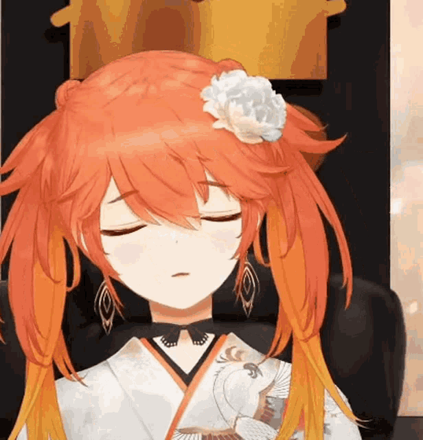 a girl with orange hair and a flower in her hair is sitting in a chair .