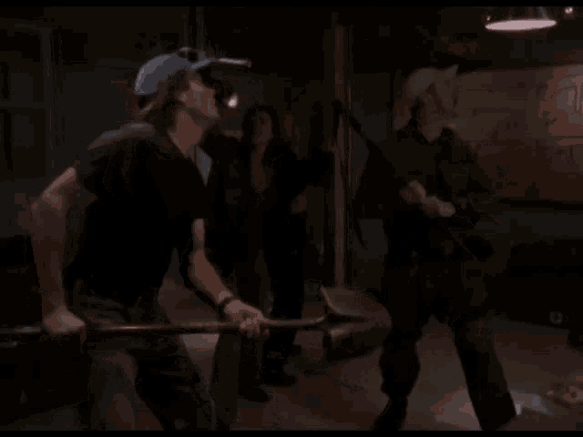 a man in a blue hat is holding a shovel in his hand