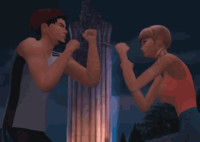 a man and a woman are fighting each other in front of a pillar