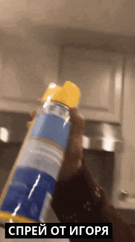 a person is holding a spray bottle in their hand with the word spray on the bottom
