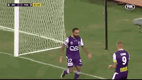 a soccer player wearing a jersey with the number 12 on it