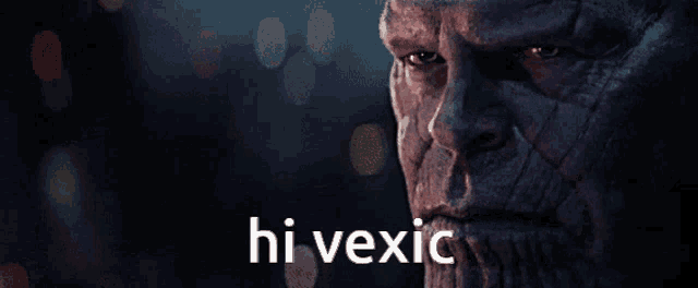 a close up of thanos ' face with the words hi vexic below him