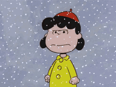 a cartoon character wearing a yellow coat and red hat is standing in the snow