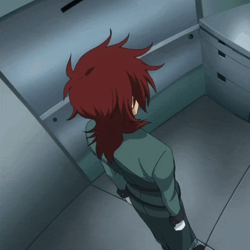 a cartoon character with red hair and a yellow e on his shirt