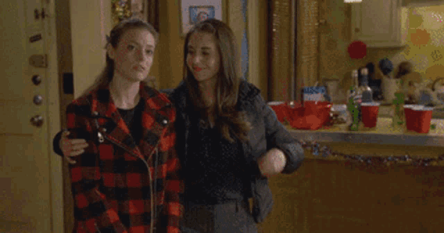 an ad for female friends shows two girls hugging each other