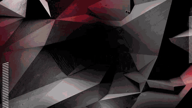 a black and red background with geometric shapes and a ruler