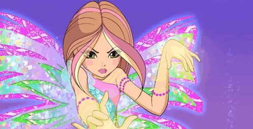 a girl with wings is holding a key in her hand .