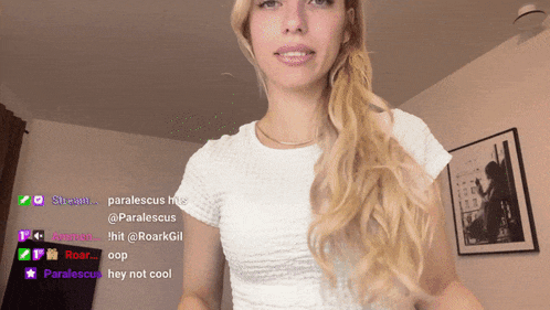 a woman in a white shirt stands in front of a screen that says " hey not cool " on it