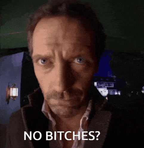 a close up of a man 's face with the words no bitches below him