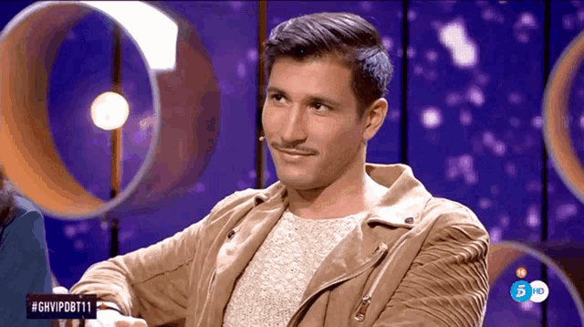 a man with a moustache is on a tv show called ghvipdb111