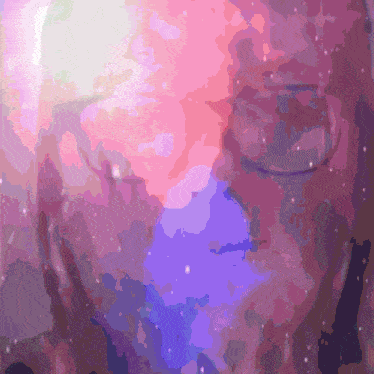 a purple and pink background with a person 's face