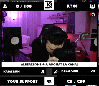 a man wearing headphones is talking into a microphone on a screen that says kamerun