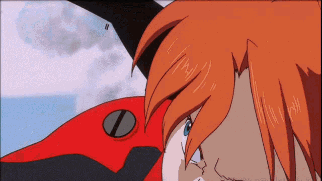 a close up of a person 's face with red hair