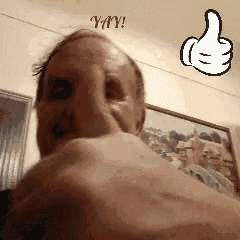 a man giving a thumbs up next to a picture of a hand