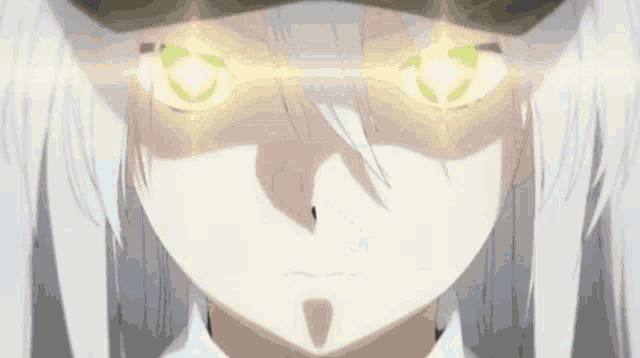 a close up of a girl 's face with glowing green eyes