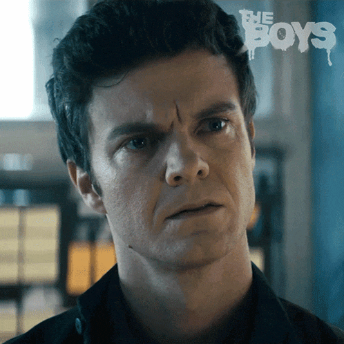 a close up of a man 's face with the words " the boys " on the bottom