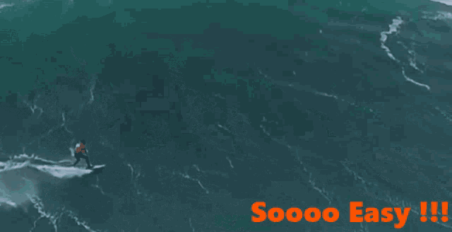 a surfer is riding a wave with the words soooo easy !!! below him