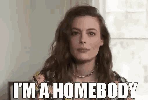 a woman is saying `` i 'm a homebody '' while looking at the camera .