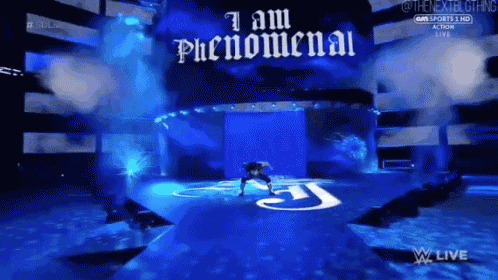 a man is on a stage with the words i am phenomenal written on it