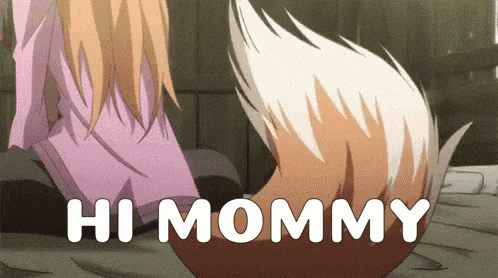 a fox tail says hi mommy in front of a girl in a pink shirt