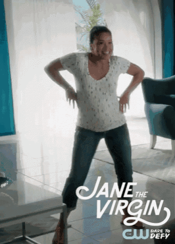 a woman is dancing in a living room with the words jane the virgin on the bottom