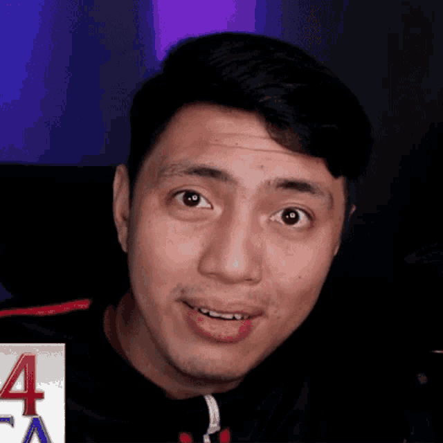 a close up of a man 's face with the number 4 on the bottom right