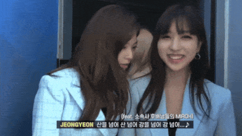 two women standing next to each other with jeongyeon on the bottom right