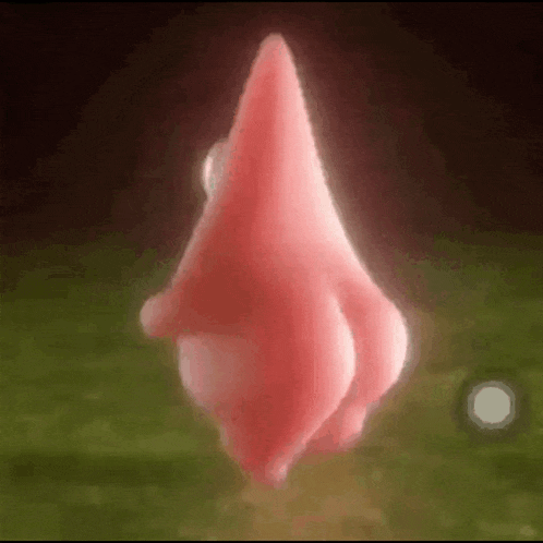 patrick star from spongebob squarepants is walking on a green field .
