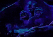 a purple background with a few glowing lights