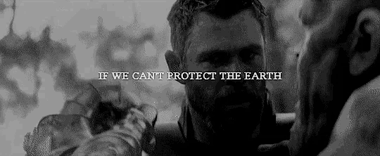 a black and white photo of a man with a beard and a quote .