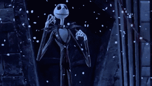 jack skellington from the nightmare before christmas is dancing in the snow in a dark room .