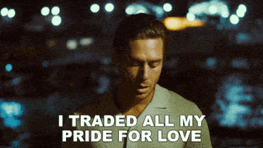 a man in a white shirt says i traded all my pride for love