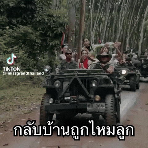 a group of people are riding in jeep 's on a road with tiktok written in the corner