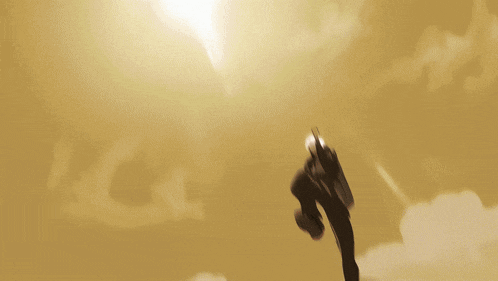 a blurred image of a person standing in front of a light